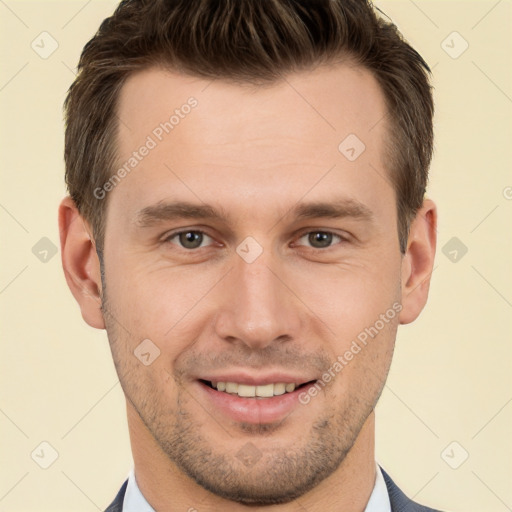 Joyful white young-adult male with short  brown hair and brown eyes