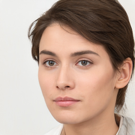 Neutral white young-adult female with medium  brown hair and brown eyes