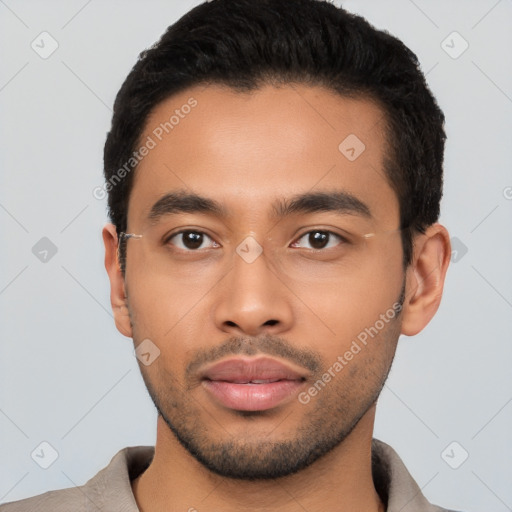 Neutral latino young-adult male with short  black hair and brown eyes