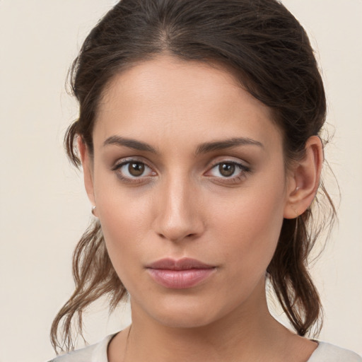 Neutral white young-adult female with medium  brown hair and brown eyes