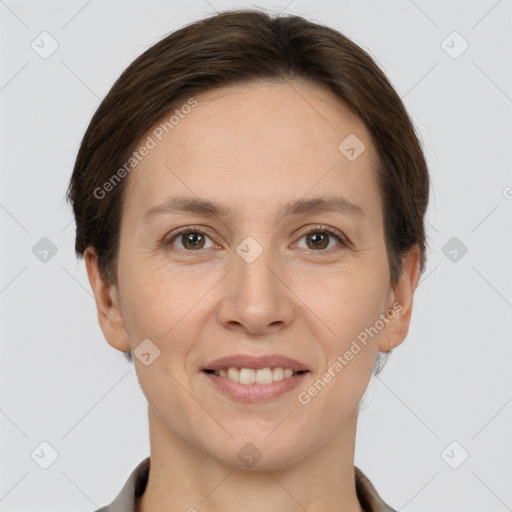 Joyful white adult female with short  brown hair and brown eyes