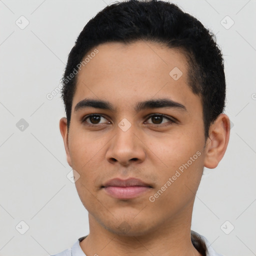 Neutral latino young-adult male with short  black hair and brown eyes