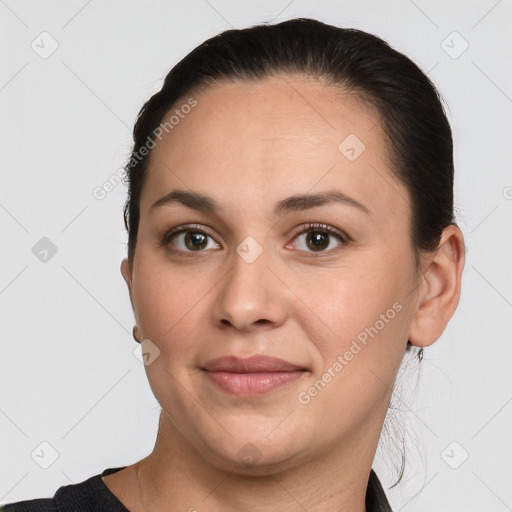 Joyful white young-adult female with short  brown hair and brown eyes