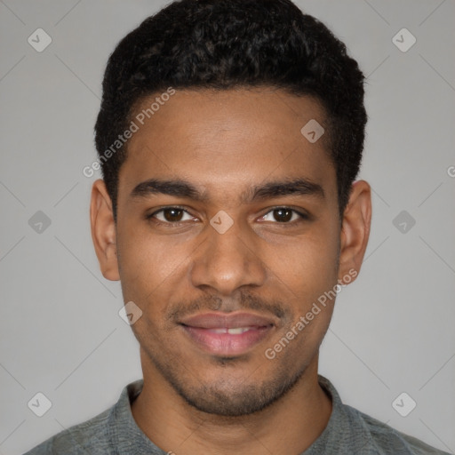 Joyful black young-adult male with short  brown hair and brown eyes