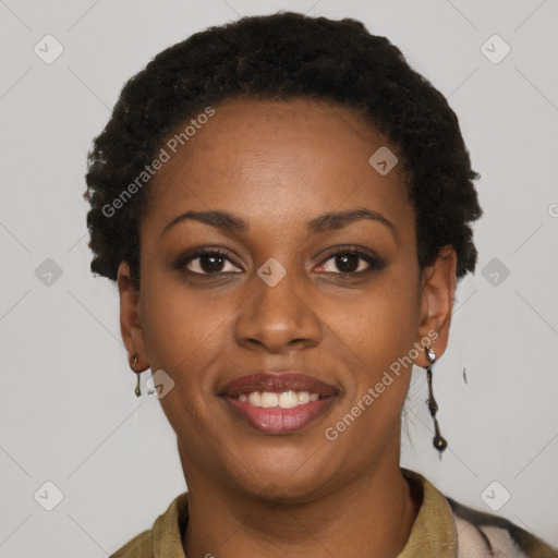 Joyful black young-adult female with short  brown hair and brown eyes