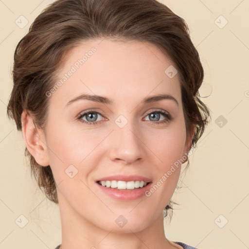 Joyful white young-adult female with medium  brown hair and green eyes