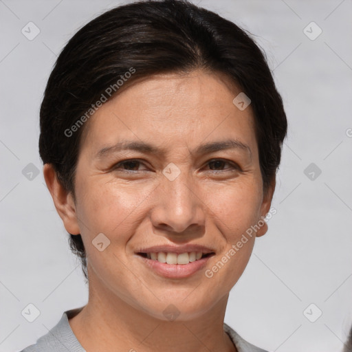 Joyful white adult female with short  brown hair and brown eyes