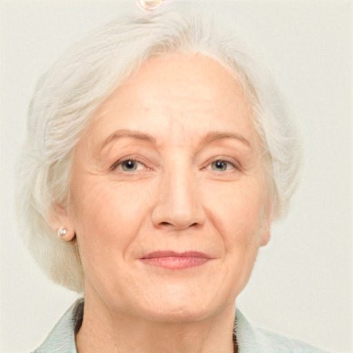 Joyful white middle-aged female with medium  blond hair and blue eyes