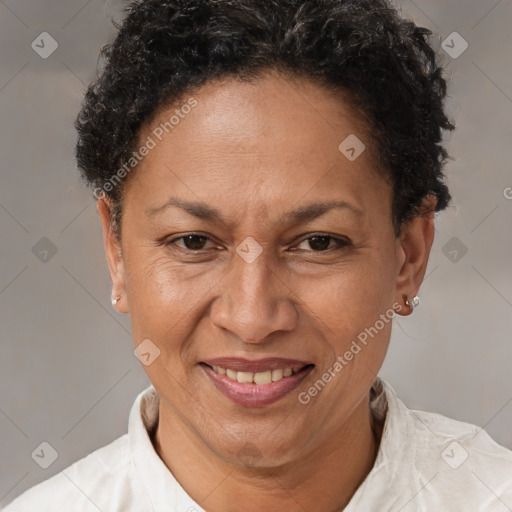 Joyful black adult female with short  brown hair and brown eyes