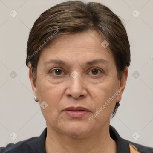 Joyful white adult female with short  brown hair and brown eyes