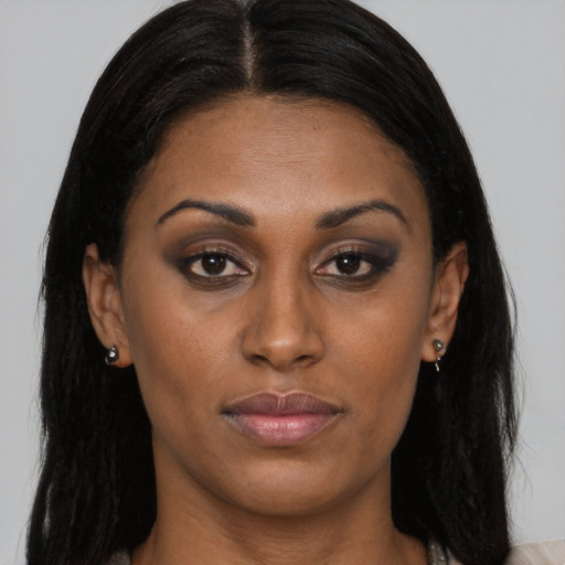 Neutral latino young-adult female with long  brown hair and brown eyes