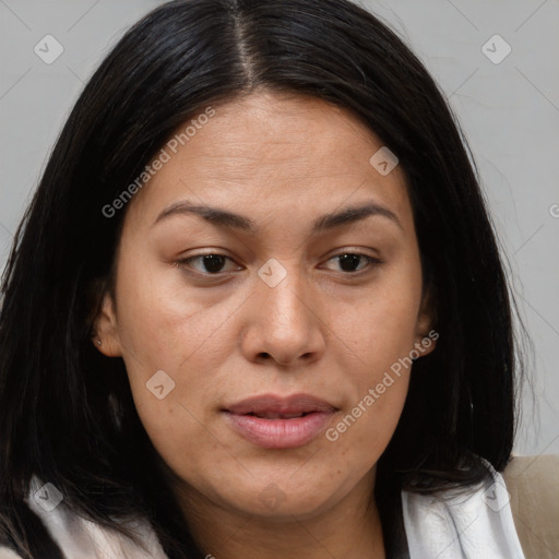 Joyful asian adult female with medium  brown hair and brown eyes