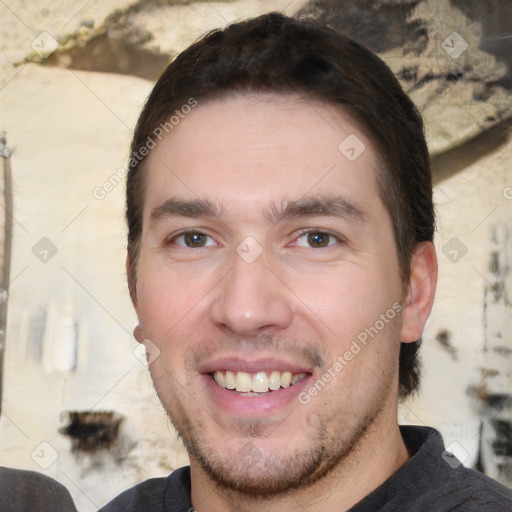 Joyful white young-adult male with short  brown hair and brown eyes