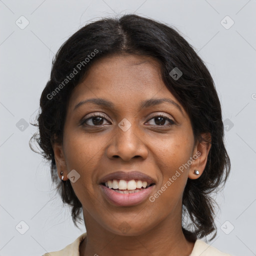 Joyful black young-adult female with long  brown hair and brown eyes