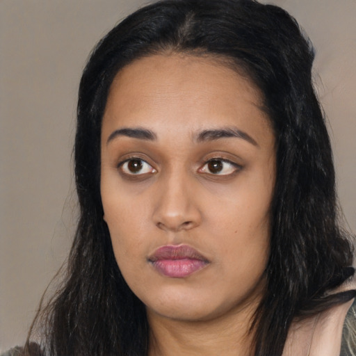Neutral latino young-adult female with long  black hair and brown eyes