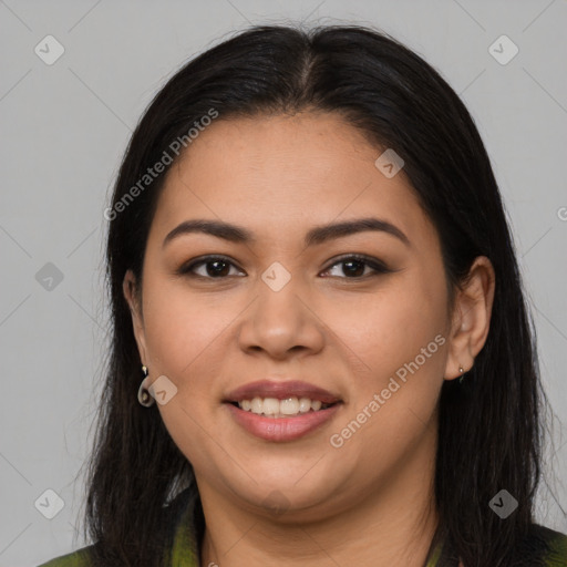 Joyful latino young-adult female with long  brown hair and brown eyes