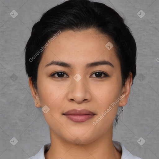 Joyful asian young-adult female with short  black hair and brown eyes