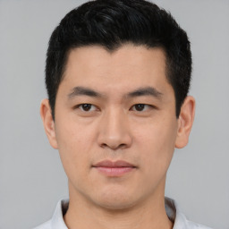 Neutral asian young-adult male with short  black hair and brown eyes