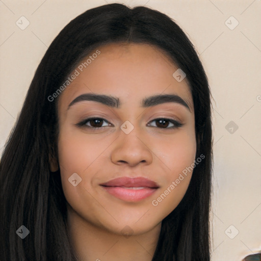 Joyful latino young-adult female with long  black hair and brown eyes