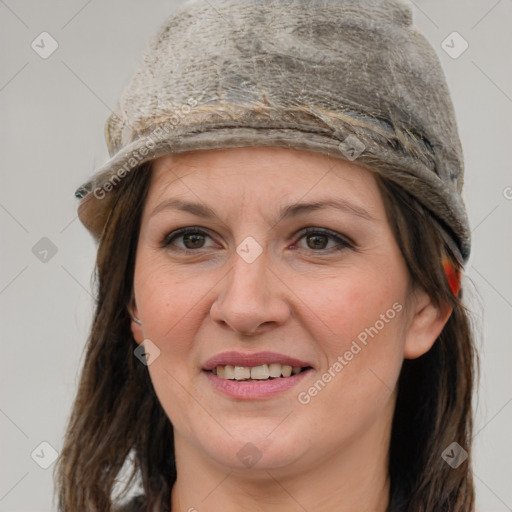 Joyful white adult female with medium  brown hair and grey eyes