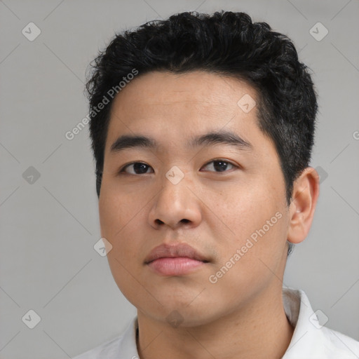 Neutral asian young-adult male with short  black hair and brown eyes