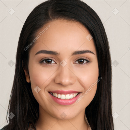 Joyful white young-adult female with long  black hair and brown eyes