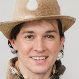 Joyful white adult male with short  brown hair and grey eyes