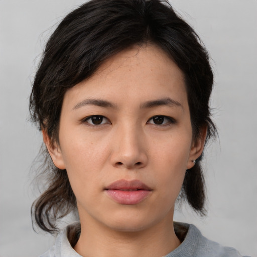 Neutral asian young-adult female with medium  black hair and brown eyes