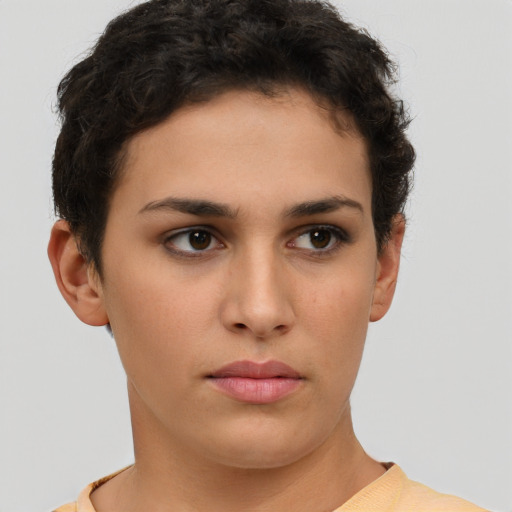 Neutral white young-adult female with short  brown hair and brown eyes