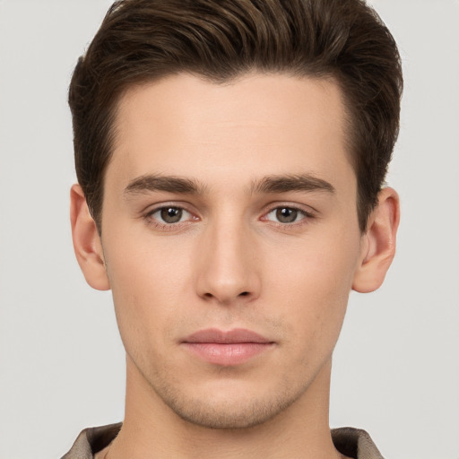 Neutral white young-adult male with short  brown hair and brown eyes