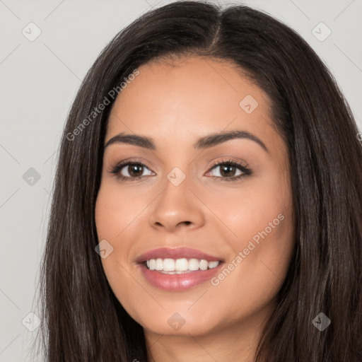 Joyful white young-adult female with long  black hair and brown eyes