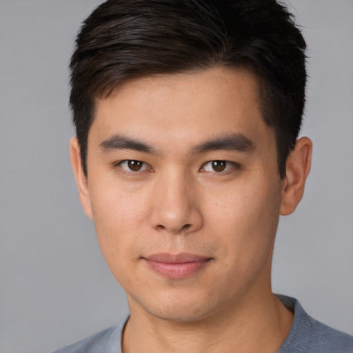 Neutral asian young-adult male with short  brown hair and brown eyes