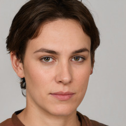 Neutral white young-adult female with medium  brown hair and brown eyes