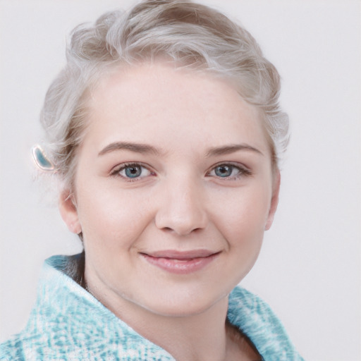 Joyful white young-adult female with medium  blond hair and blue eyes