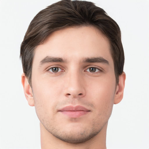 Neutral white young-adult male with short  brown hair and brown eyes