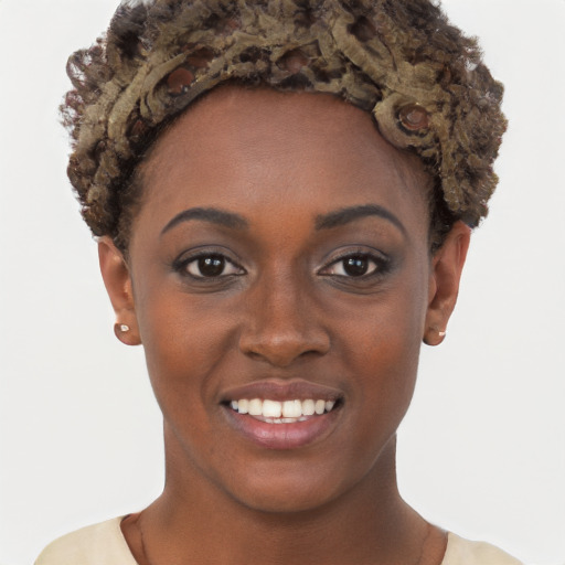 Joyful black young-adult female with short  brown hair and brown eyes