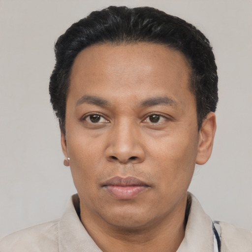 Neutral asian adult male with short  black hair and brown eyes