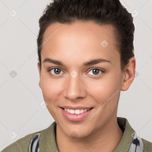 Joyful white young-adult female with short  brown hair and brown eyes