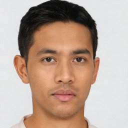 Neutral asian young-adult male with short  brown hair and brown eyes