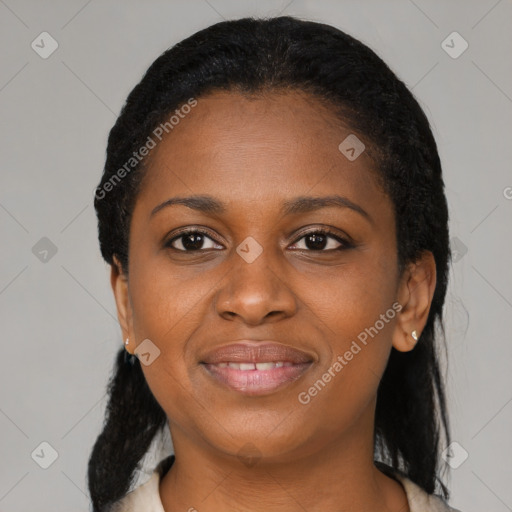 Joyful black young-adult female with medium  black hair and brown eyes