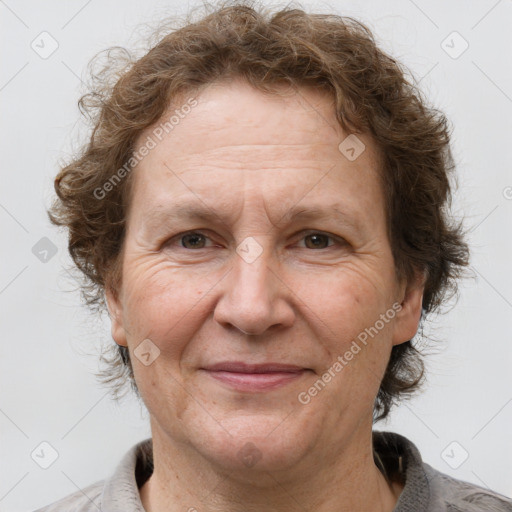 Joyful white middle-aged female with short  brown hair and brown eyes