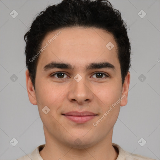 Joyful latino young-adult male with short  brown hair and brown eyes