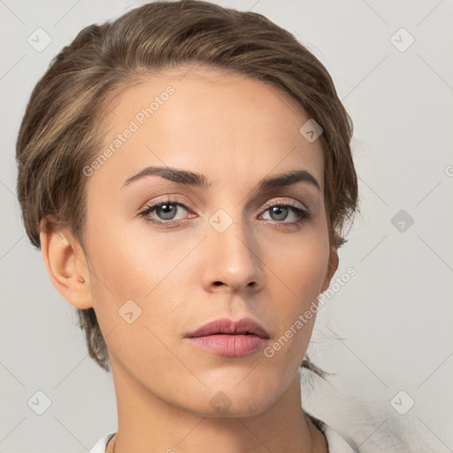 Neutral white young-adult female with short  brown hair and brown eyes