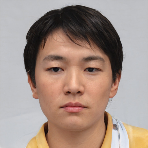Neutral asian young-adult male with short  brown hair and brown eyes
