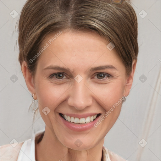 Joyful white young-adult female with short  brown hair and grey eyes