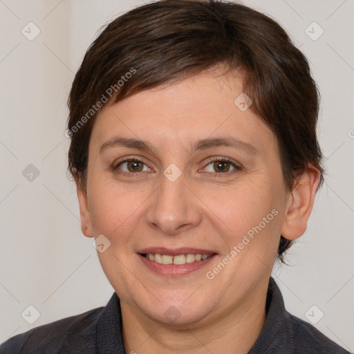 Joyful white adult female with medium  brown hair and brown eyes