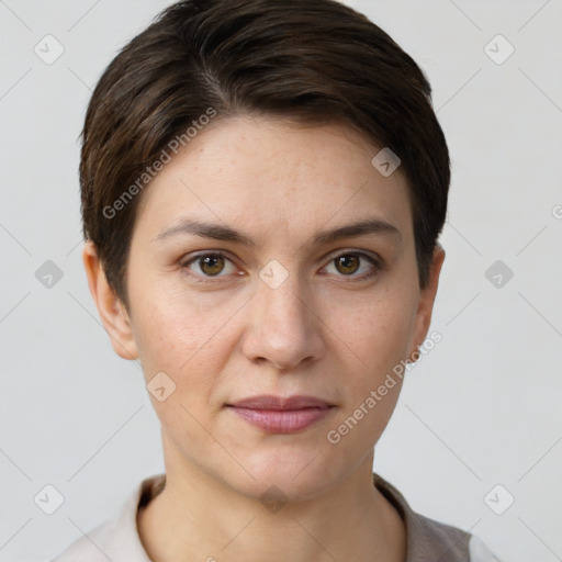 Joyful white young-adult female with short  brown hair and brown eyes