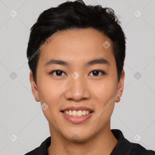 Joyful asian young-adult male with short  black hair and brown eyes