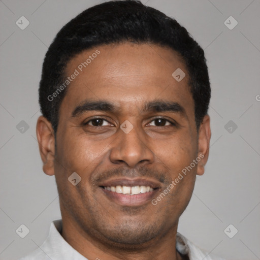 Joyful latino young-adult male with short  black hair and brown eyes