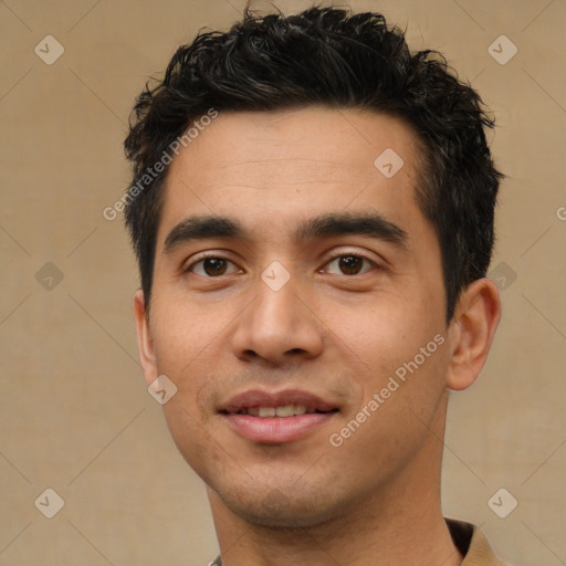 Joyful white young-adult male with short  black hair and brown eyes